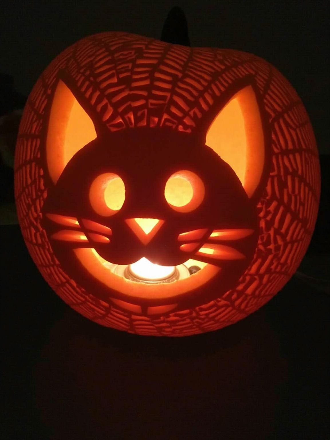 intricate spider web carvings