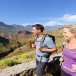 The Quiet Rituals Hikers Do While Watching the Sunset Over a Mountain Trail