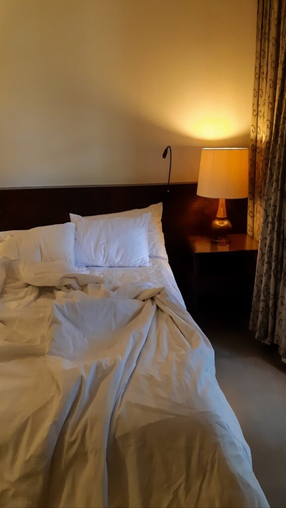 Warm Table Lamp on the Nightstand