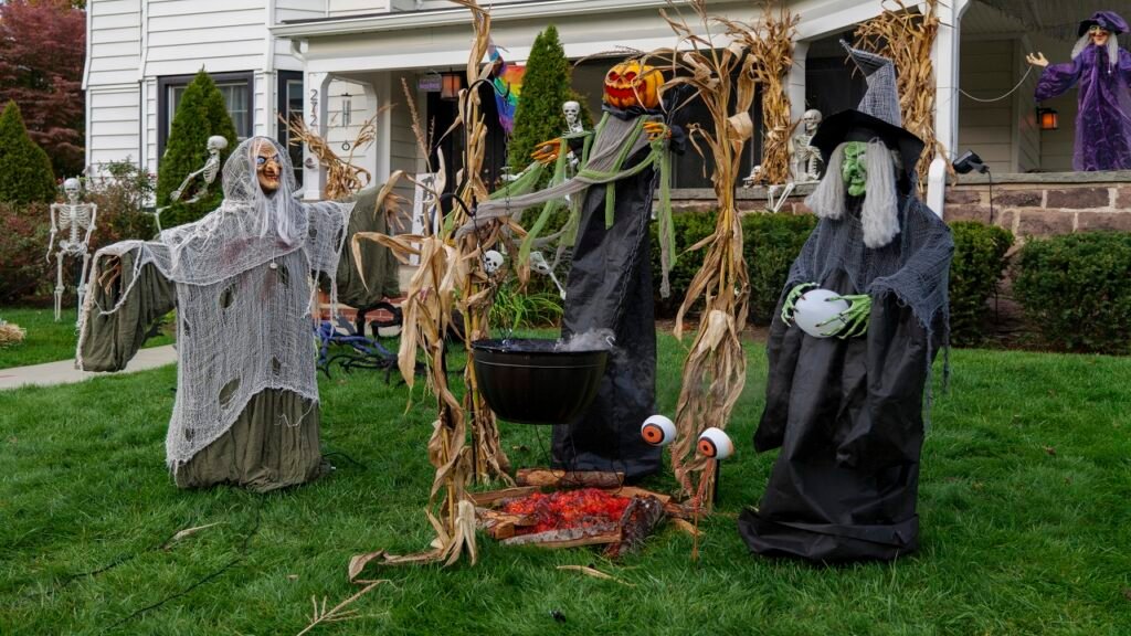 Friendly Scarecrow Figures in the Yard Bring Warmth and Whimsy to the Whole Display